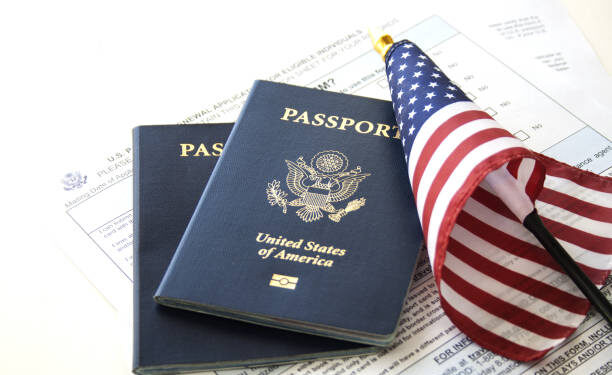 US Passports with flag and renewal forms