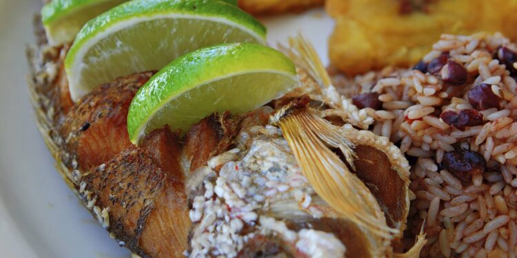 fried red snapper with pinto beans rice and tostones (cuban plantains)