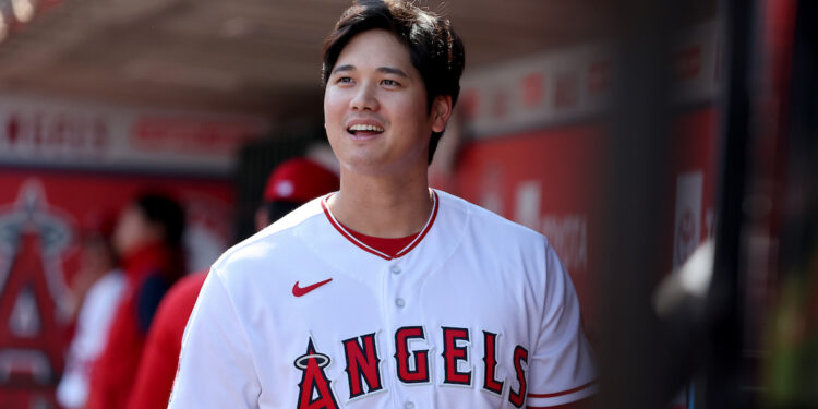Oct 2, 2022; Anaheim, California, USA;  Los Angeles Angels designated hitter Shohei Ohtani (17) smiles in the dugout before the game against the Texas Rangers at Angel Stadium. Mandatory Credit: Kiyoshi Mio-USA TODAY Sports