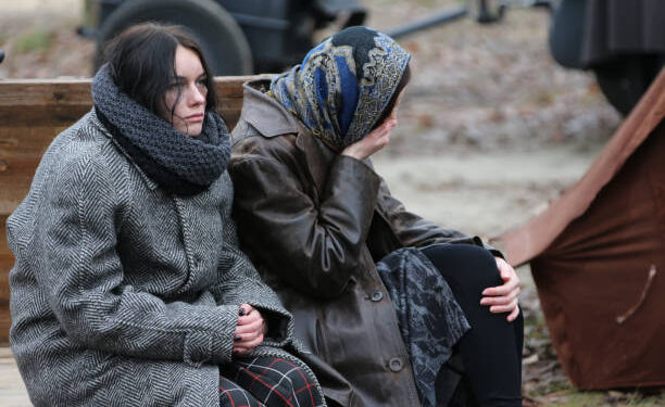 Belarus, Gomul, November 21, 2015. Streets of the town. Reconstruction. Tired women are sitting in the cold. Refugees. Refugees