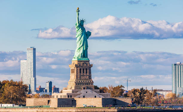Liberty Island, New York City, New York, USA. The Statue of Liberty seen from New York Harbor.