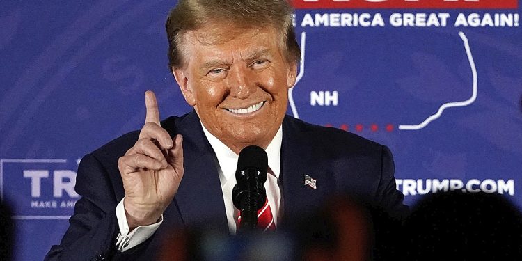 TOPSHOT - Republican presidential hopeful and former US President Donald Trump gestures as he speaks during a rally in Laconia, New Hampshire, January 22, 2024. (Photo by TIMOTHY A. CLARY / AFP)