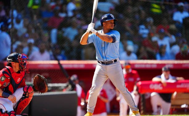 SANTO DOMINGO, DR - MARCH 10:  Francisco Mejía #0 of the Tampa Bay Rays hits a double in the sixth inning during the game between the Tampa Bay Rays and the Boston Red Sox at Estadio Quisqueya on Sunday, March 10, 2024 in Santo Domingo, Dominican Republic. (Photo by Mary DeCicco/MLB Photos via Getty Images)